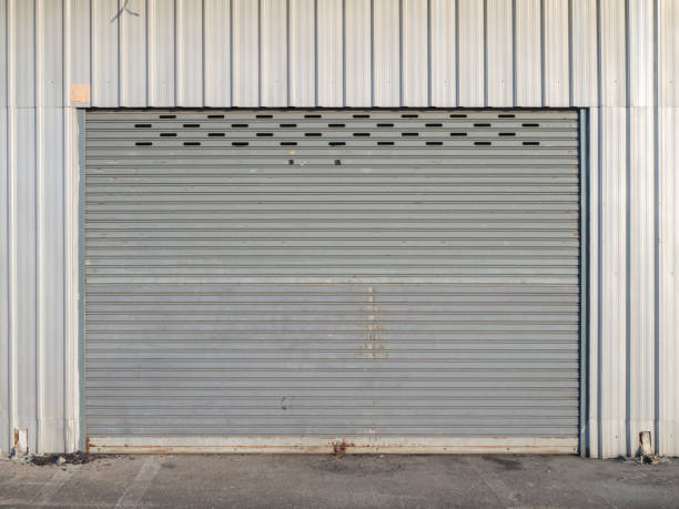 istock front view of grunge close shutter door or rolling door 1126161104