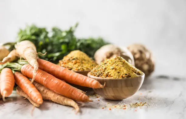 Seasoning spices condiment vegeta from dehydrated carrot parsley celery parsnips and salt with or without glutamate.