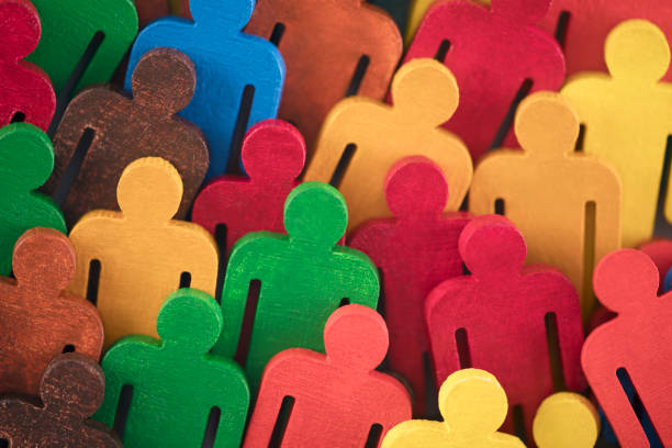 istock Colorful painted group of people figures 1126163005