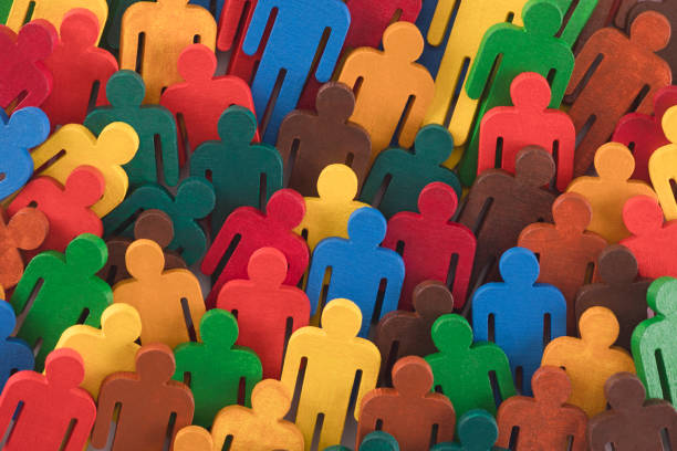 istock Colorful painted group of people figures 1126163124