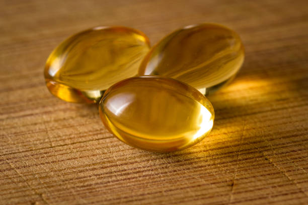 kapsułki olejowe cbd - capsule pill lecithin fish oil zdjęcia i obrazy z banku zdjęć