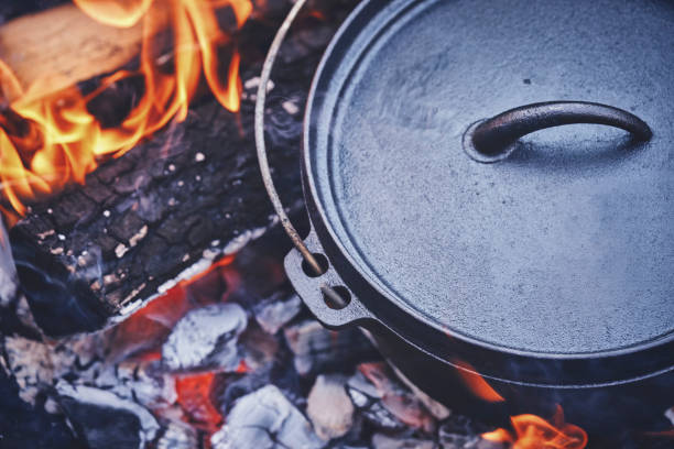 istock Cooking Chili Con Carne in Dutch Oven over Logfire 1126165636