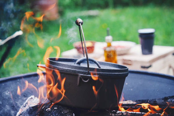 istock Cooking Chili Con Carne in Dutch Oven over Logfire 1126165642