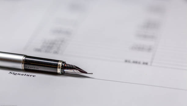 istock Ballpoint Pen Lie on Business Signature Contract Document 1126169171