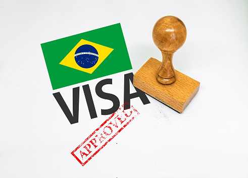 Brazil Visa Approved with Rubber Stamp and flag