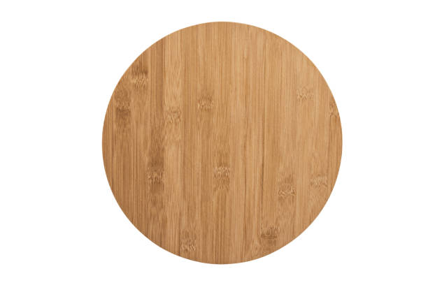 Close up on a round wooden plank, directly above. stock photo