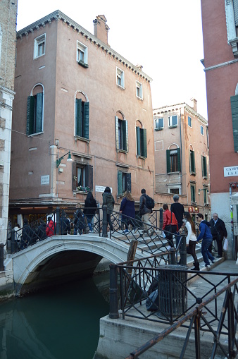 Busy Zaguri Street Bridge In Venice With Many Tourists Crossing The Bridge. Travel, holidays, architecture. March 28, 2015. Venice, Veneto region, Italy.
