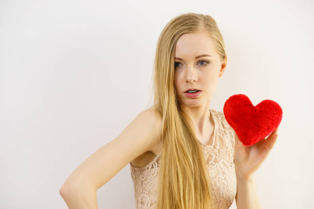 istock Sad woman on Valentines day 1126179378