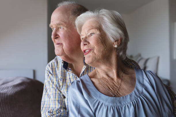 istock Senior couple sitting together 1126180013