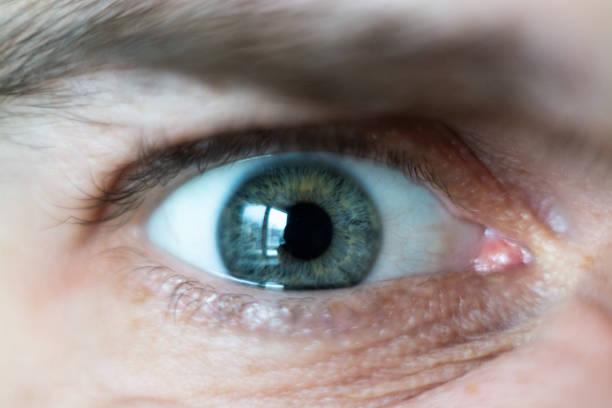 istock Close-up on male green eye 1126180191