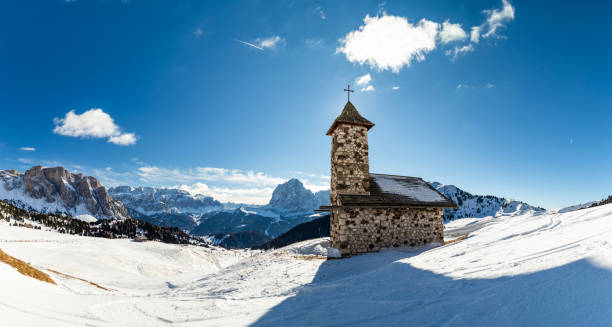 istock Dolomiti Mountains Italy winter snow church 1126180988