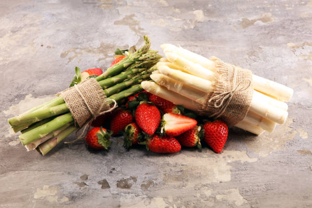 istock White and green asparagus with strawberries 1126182045