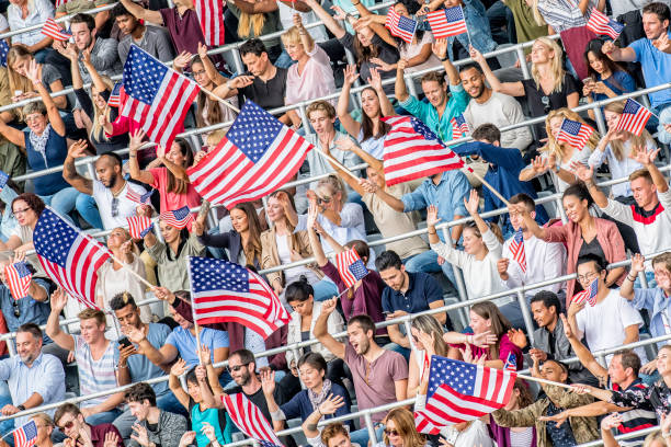 istock USA supporters waving their flags on a stadium 1126182284