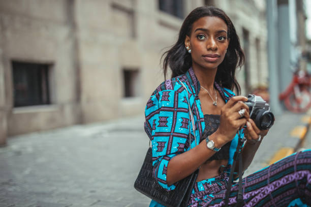 istock Beautiful woman photographer 1126184060