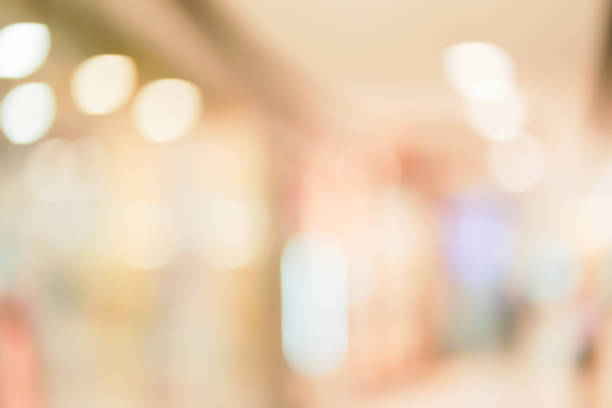 istock abstract blur inside modern architecture loft cozy interior shopping mall or department store with light bokeh fro design concept 1126184372