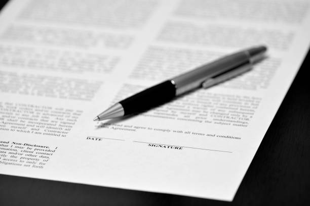 istock Contract with pen on desk signing business transaction 1126187723