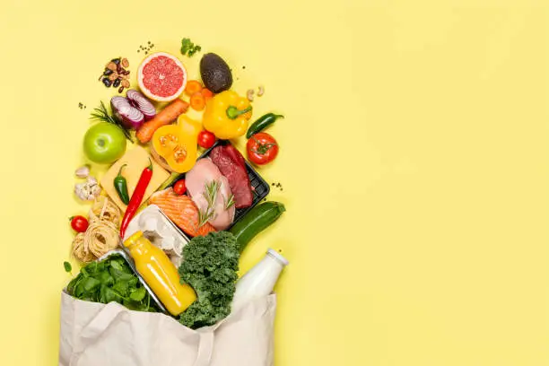 Photo of Grocery shopping concept - foods with shopping bag