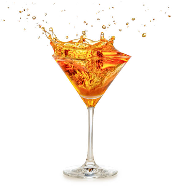 orange cocktail splashing - action alcohol alcoholism bar imagens e fotografias de stock
