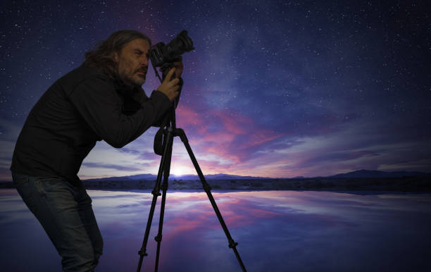 istock shooting photograph at dawn 1126192084