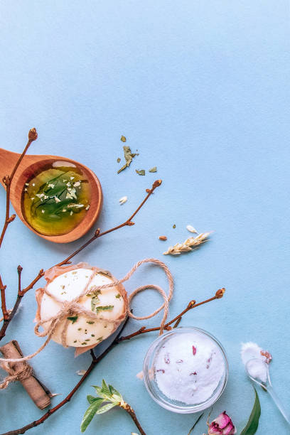 istock Natural handmade soap, spa organic, aromatic salt. Flat lay on a blue background 1126192171
