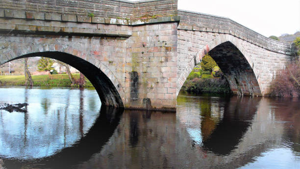 istock Bridge reflections, Froggatt, Derbyshire, UK. 1126192964