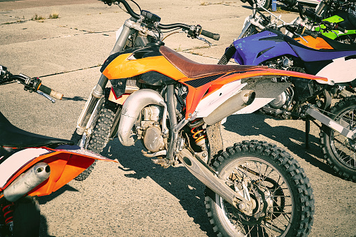 Motocross bike Enduro in the Parking lot. Side view