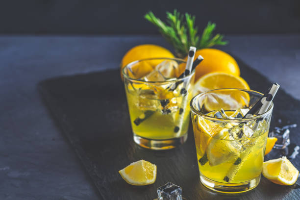 istock Lemon alcohol drink cocktail with ice, lemon and rosemary 1126194748