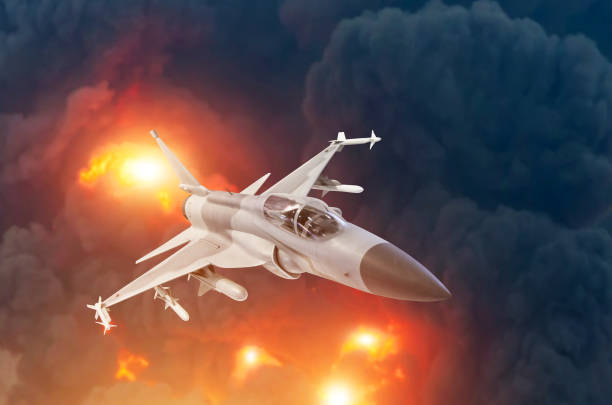 istock Military jet fighter aircraft flying backdrop of a powerful explosion. War strike concept. 1126198256