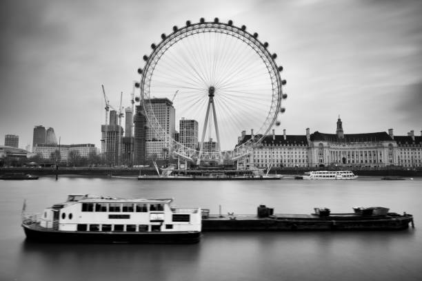 London, England - February 21, 2018: Morning image of London.. The Thames embankment and the London Eye ferris wheel