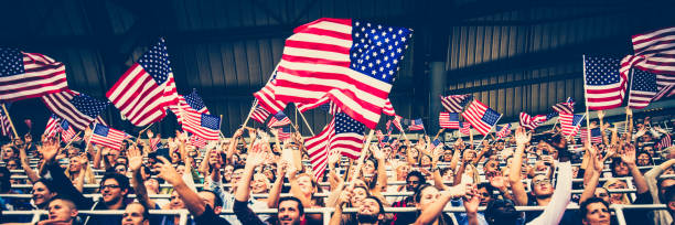 istock USA fans waving flags 1126205883