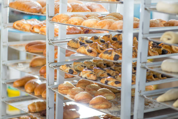 istock racks with finished and raw dough products in a bakery 1126210778