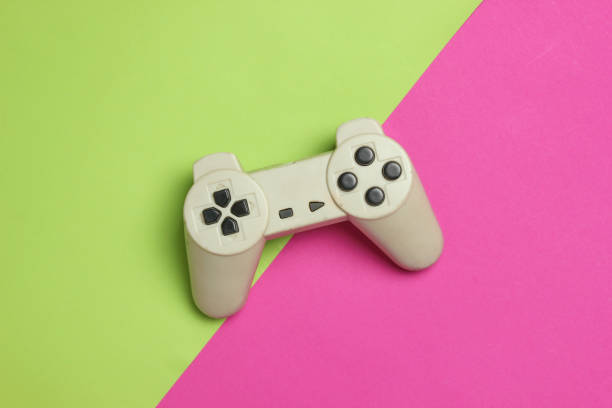 istock Gamepad on a color background. Top view, minimalism. 1126211711