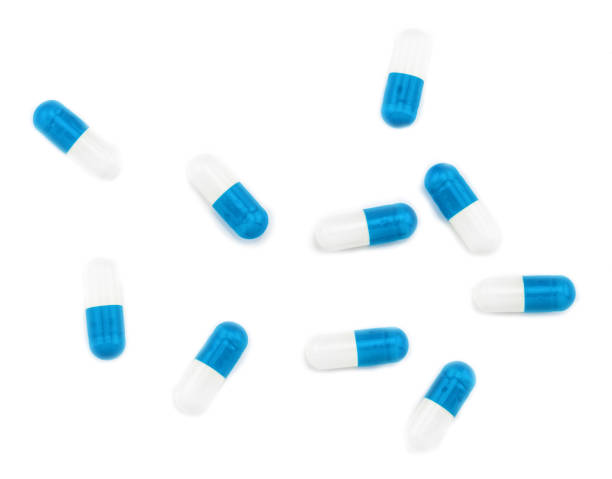 istock pills capsules isolated on white background. With clipping path 1126212554