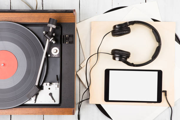 istock Vintage turntable, smartphone and headphones 1126224576