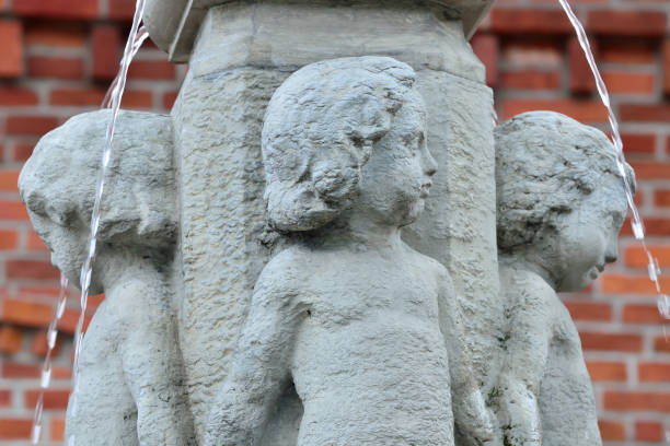 Stone figure of baroque style fountain statue detail
