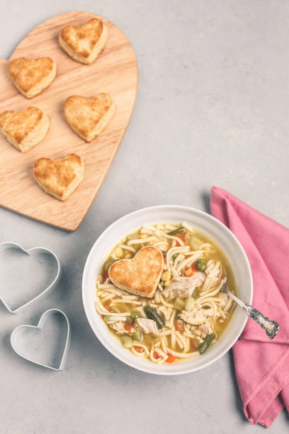 istock Heart-Shaped Biscuits with Homemade Chicken Soup 1126237359