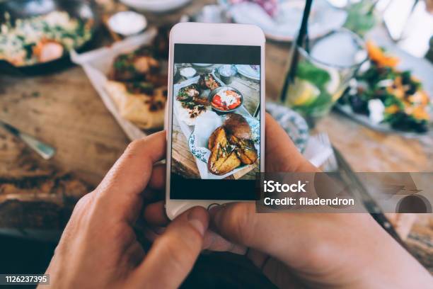 Sharing Food Stock Photo - Download Image Now - Photograph, Restaurant, Photography