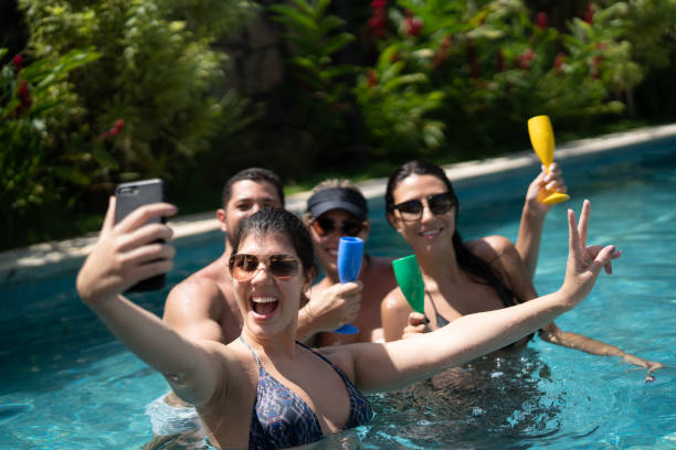 istock Friends taking a Selfie at Swimming Pool 1126247026