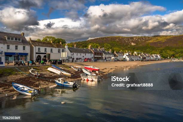 City Of Ullapool With Old Fishing Boat At Loch Broom In Scotland Stock Photo - Download Image Now