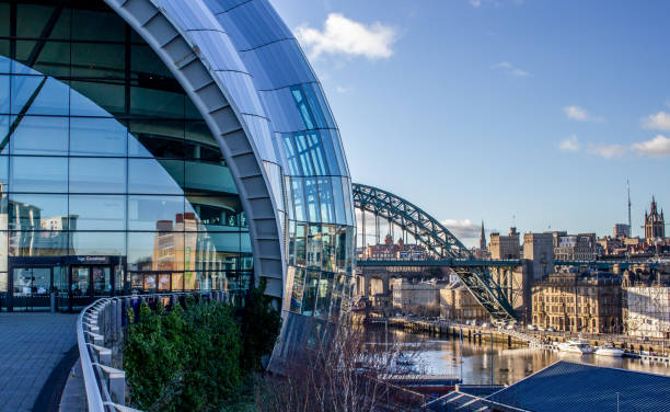 The Sage & Tyne Bridge. Gateshead, England. January 30, 2019. View of the Sage from Gateshead quayside with the tyne bridge in the horizon. tyne bridge stock pictures, royalty-free photos & images