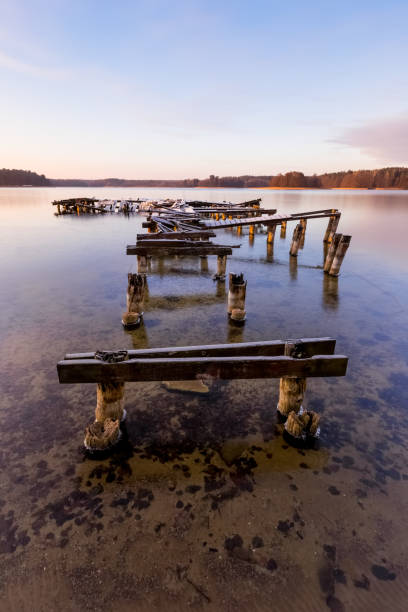 istock Destroyed pier on a freezing lake 1126261123