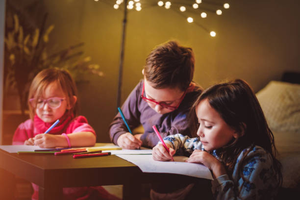 istock Small group of kids playing and drawing 1126261776