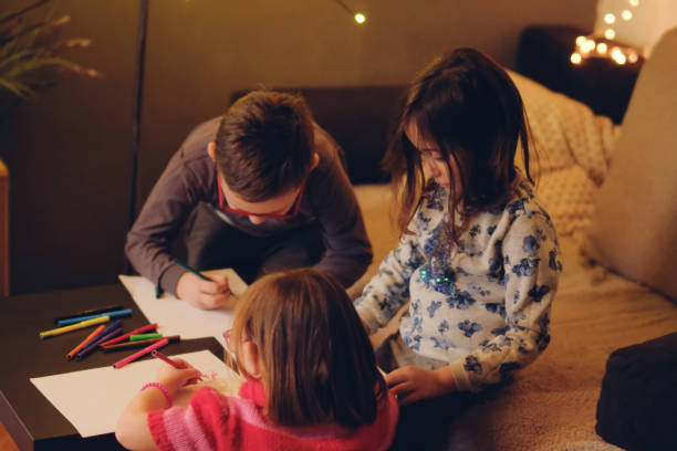 istock Small group of kids playing and drawing 1126263592