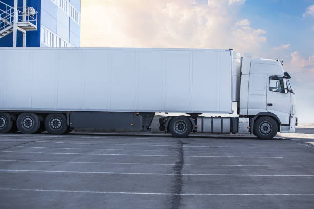 istock truck is loaded at a large warehouse 1126265703