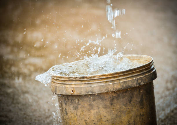 istock rainwater harvesting in the bucket after heavy rain 1126301341