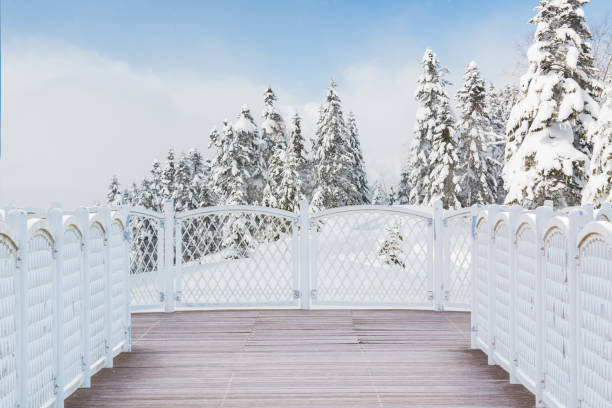 istock White balcony with perspective wood floor nature background. 1126306245