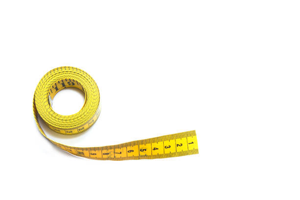 istock Yellow centimeter isolated on white background. View from above 1126310744