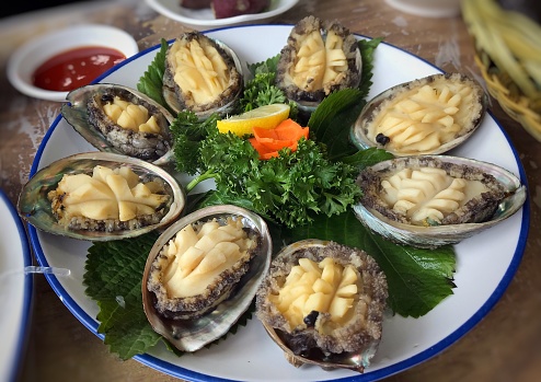 A delicious stream abalone platter serve in a seafood market