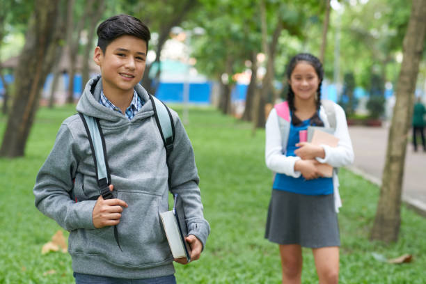 istock Teenage boy with book 1126316125