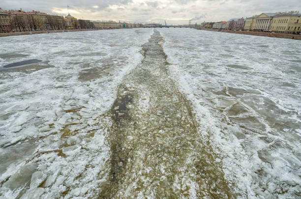 istock The river in the city is covered with ice. 1126328172